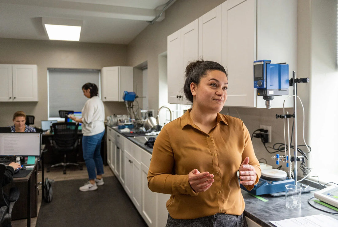  Mara Reed, research and development manager, talks about the process of making different cosmetics for companies Tuesday, April 19, 2022, at Artisan Labs in Hansen.