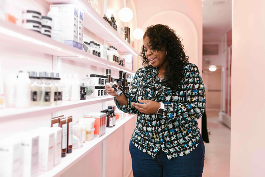 Woman shopping for cosmetics