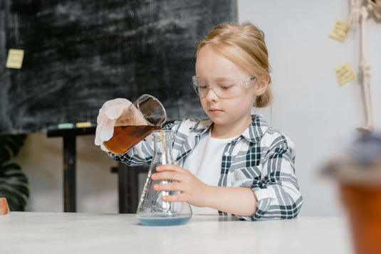 Girl holding beaker